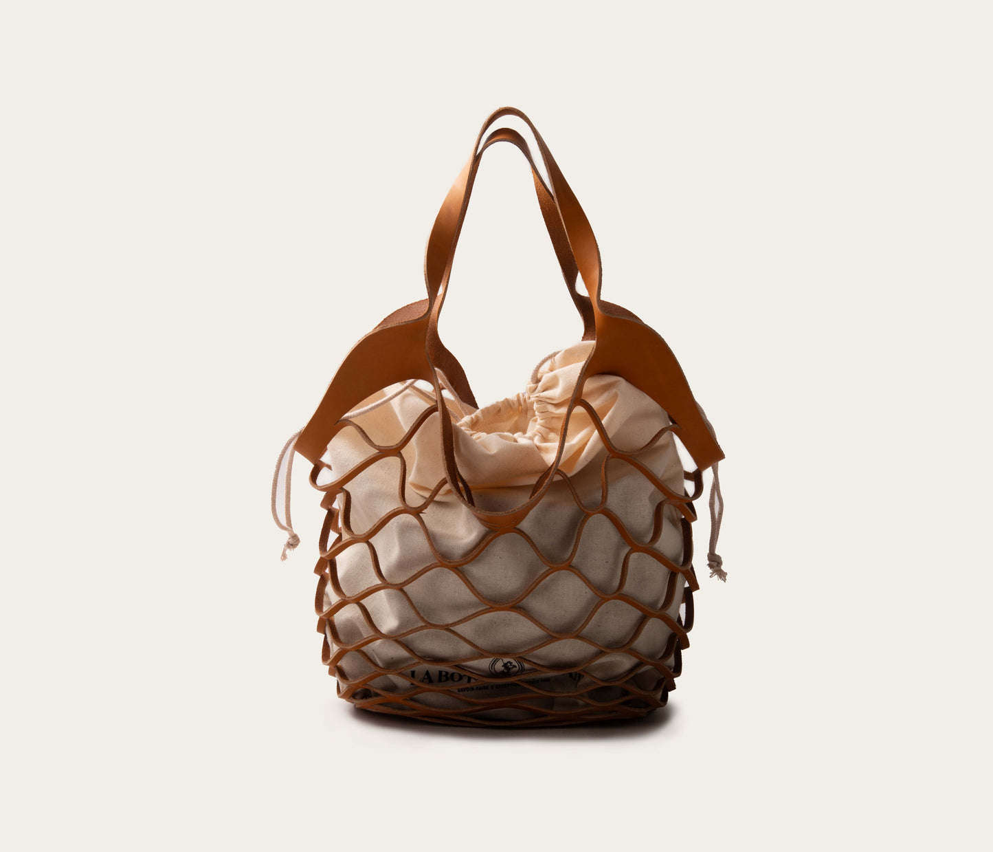 sac filet en cuir, la botte gardiane sac filet avec pochon, sac filet en cuir suportlo, sac Camargue, sac artisanal en cuir