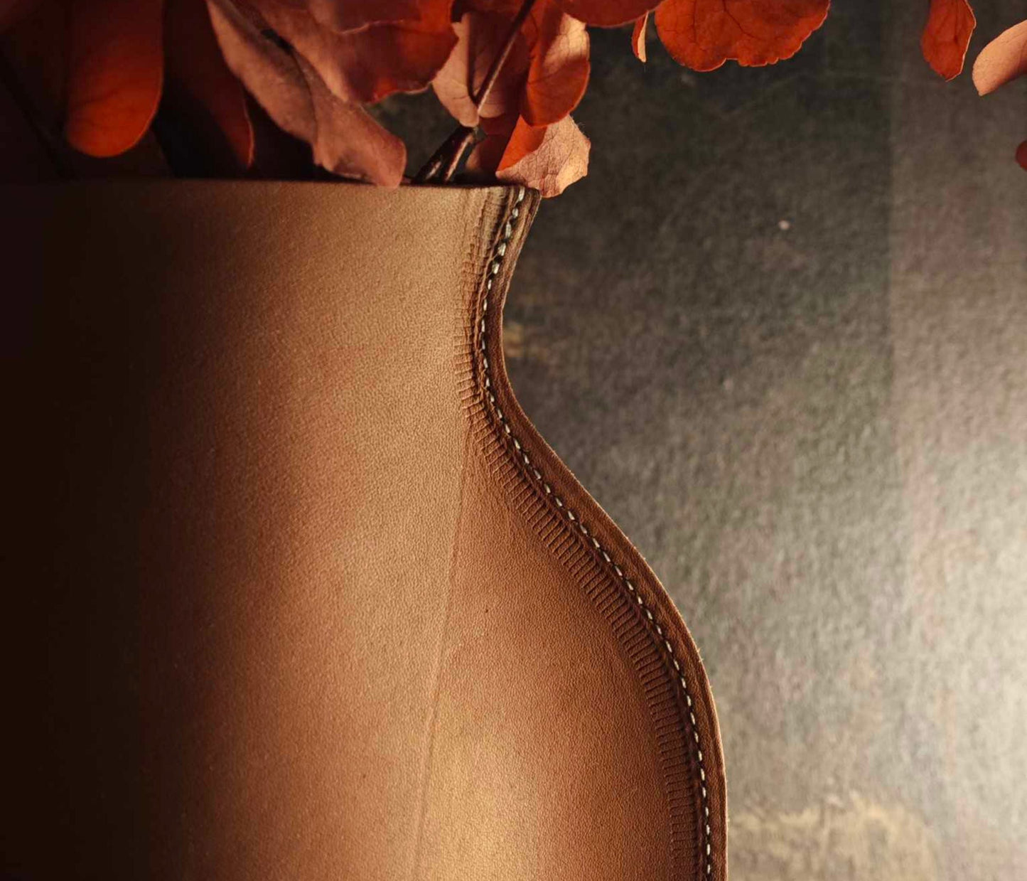 Vase en cuir, Cache-Vase